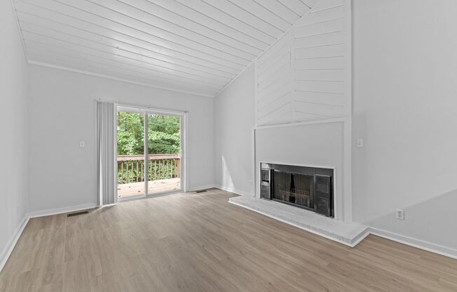 AVAILABLE NOW - Updated 2 Bedroom Duplex w/ Fenced-in Backyard, Large Deck, LVP Floors, Pet Friendly!