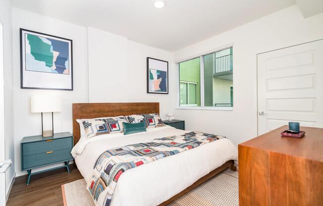 Well-appointed secondary bedrooms feature oversized windows, contemporary finishes, and flexible layouts suited for guests, roommates, or a home office setup.