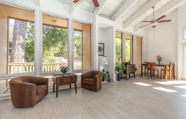 A living room with a brown chair and a brown table.