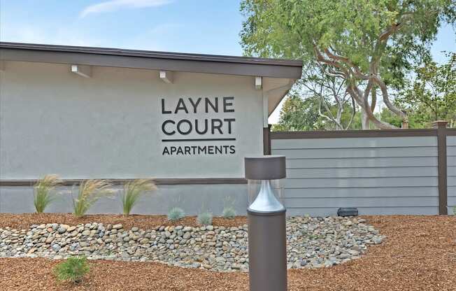 Layne Court sign on building