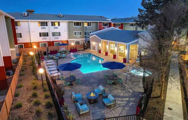 an aerial view of a swimming pool at night