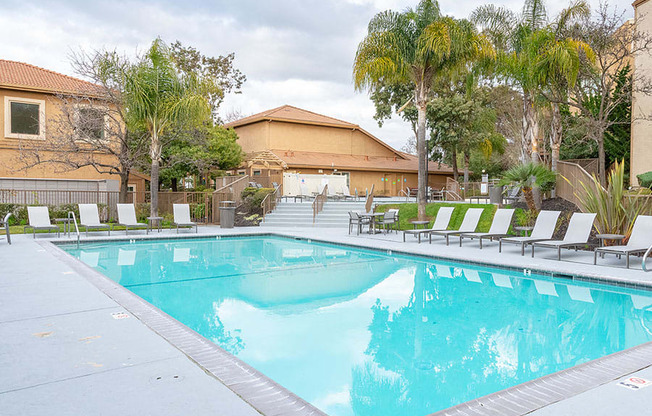Apartments in Richmond CA - Bella Vista at Hilltop - Sparkling Pool Surrounded by Lounge Seating