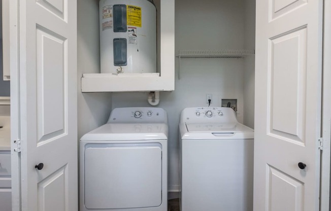 a washer and dryer in the laundry room of a manufactured home