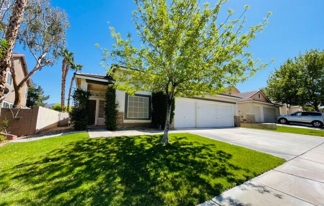Single-story 4 Bed nestled in the desirable Green Valley Ranch!  3 Car Garage!