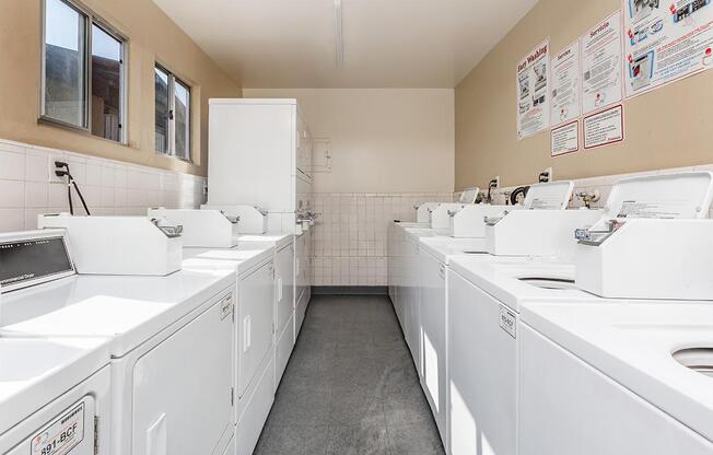 a large white tub sitting next to a sink