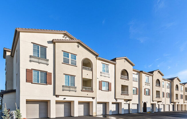 Apartment exterior showcasing resident garages