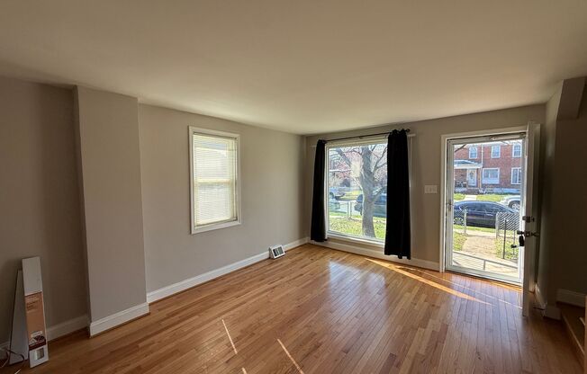 End Unit 3BR Townhome in Dundalk | Fresh Paint, Refinished Hardwood Floors, Fenced Yard, Off-Street Parking