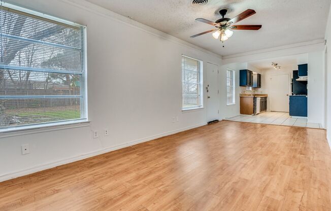 Three bedroom, 1.5 bathrooms, and a two car garage.