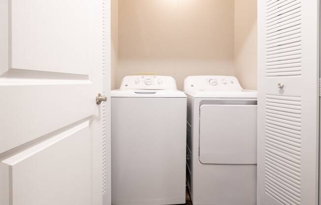 Laundry Area in the Two Bedroom Townhome at Woodbridge Apartments Bloomington