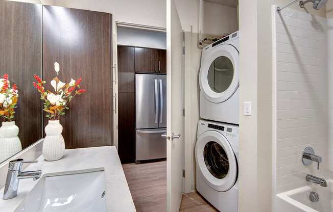 full size washer and dryer in bathroom