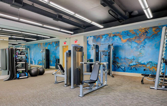 Fully-equipped fitness center at Crescent at Fells Point by Windsor 21231, MD