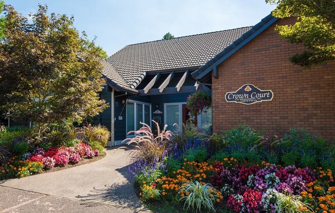 Crown Court Clubhouse Exterior Entry & Floral Landscaping