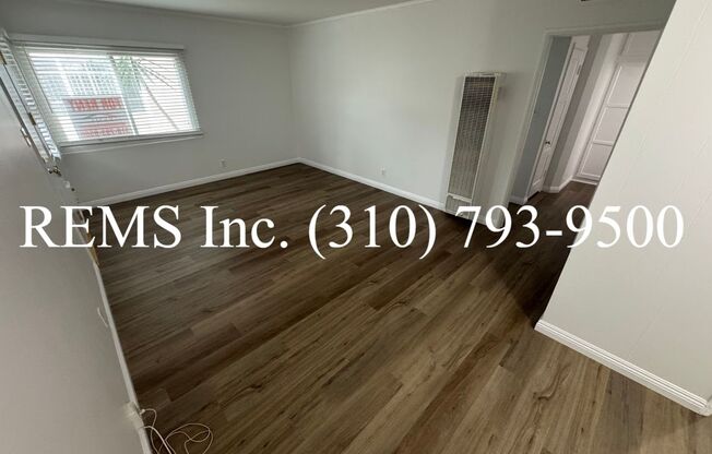 1 Bedroom Downstairs Apartment w/ (Shared) Garage Parking