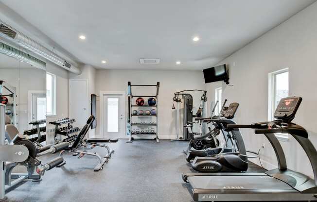 Horizon at Premier apartments fitness center with cardio equipment