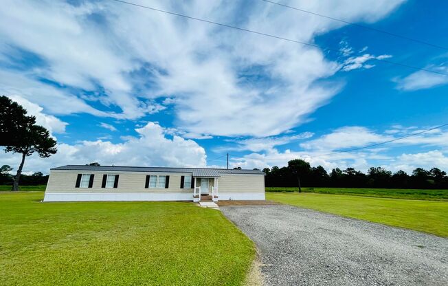 Move in ready!! Privacy and views galore with this 3BD/2BA mobile home in Aynor School District!!