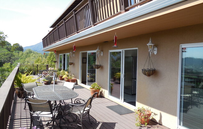 MODERN FOUR BEDROOM HOME IN THE GREENBRAE HILLS WITH STUNNING PANORAMIC VIEWS, HEATED POOL & SPA WITH POOL SERVICE PAID BY OWNER