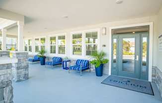 Chairs outside of a building at Trillium apartments in Melbourne fl