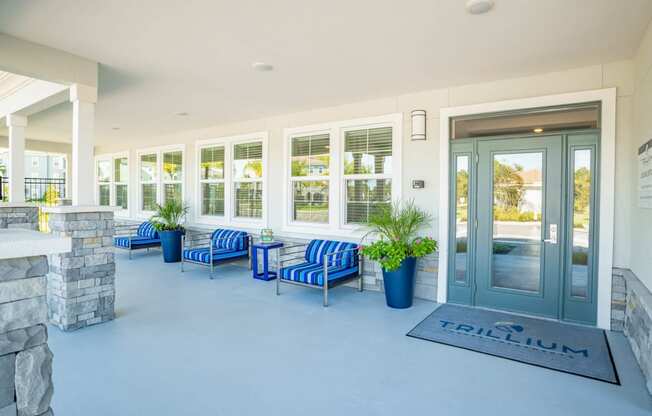 Chairs outside of a building at Trillium apartments in Melbourne fl