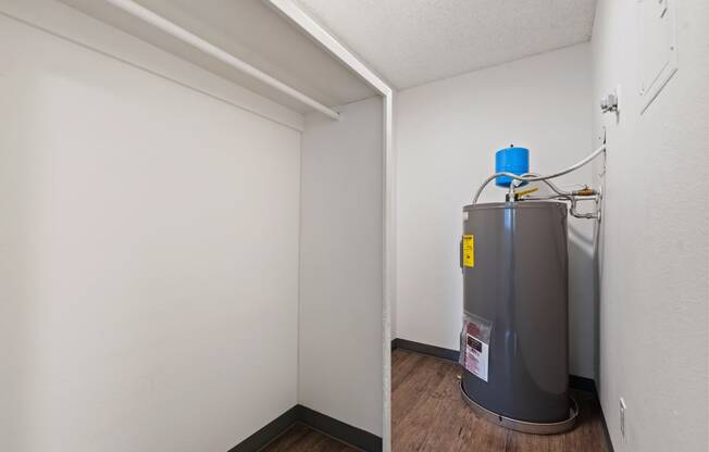A view of a large closet and a water heater in the corner at Talavera in Boise, ID