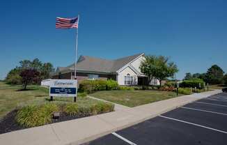 a house with an flag flying in front of it