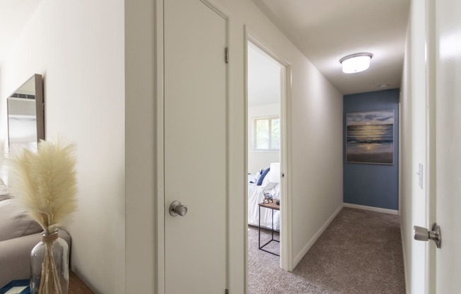 This is a photo of the hallway in a 560 square foot, 1 bedroom, 1 bath apartment at Aspen Village Apartments in Cincinnati, OH.