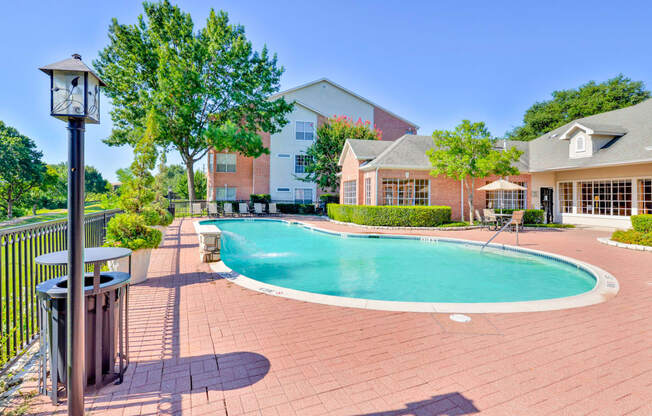 Pool and sun deck at Turnberry Isle Apartments in Far North Dallas, TX, For Rent. Now leasing 1, 2 and 3 bedroom apartments.