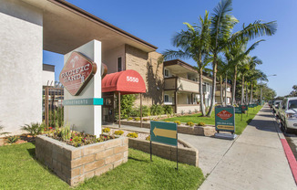 Pacific Sands entrance with tropical landscaping at Pacific Sands, San Diego, CA, 92117