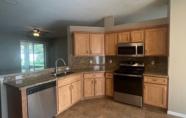 Updated Single family 3 / 2 with Screened in Patio!