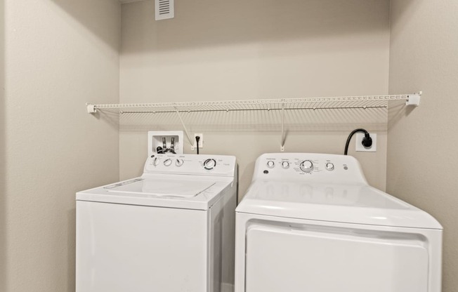 a washer and dryer in a laundry room