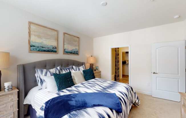 Bedroom with private bathroom and walk-in closet