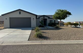 Modern 2019 Single-Family Home with Spacious Lot and Ample Garage Space in Fort Mohave, AZ