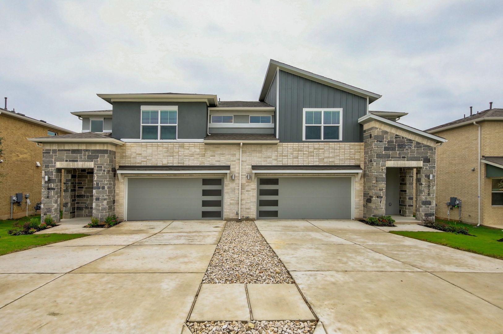 NEW TOWNHOME with 2 Car Garage & all the bells and whistles!