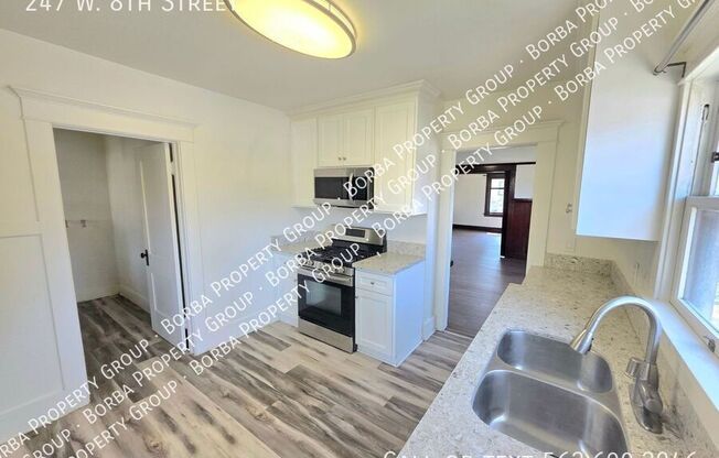247 W 8 ST
