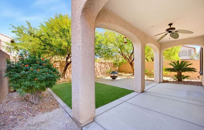 Spacious 2-Story Home w/ Two Balconies, Granite Island Kitchen & Turf Backyard – SW Las Vegas