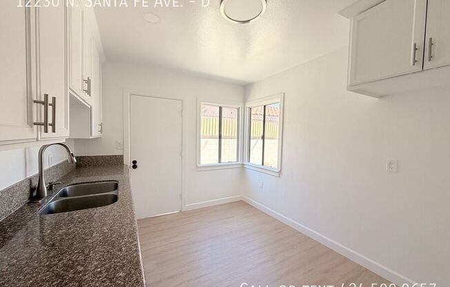 12230 N SANTA FE AVE