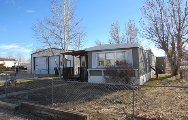 Updated Older Mobile Home w/ Quonset Garage in Bar Nunn