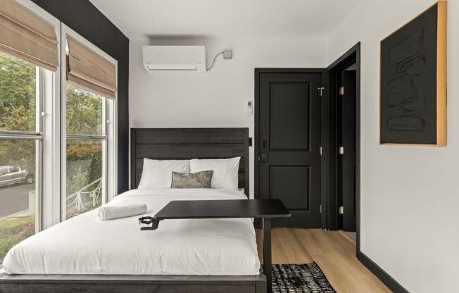 A 4 Bedroom, 3 Bathroom apartment with common areas and a fully functional kitchen at 1476 Malcolm Ave.