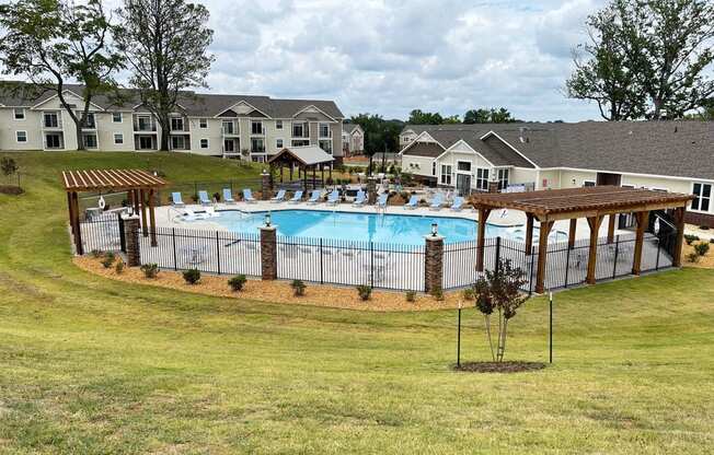 our apartments showcase an unique swimming pool  at Signature Pointe Apartment Homes, Athens, 35611