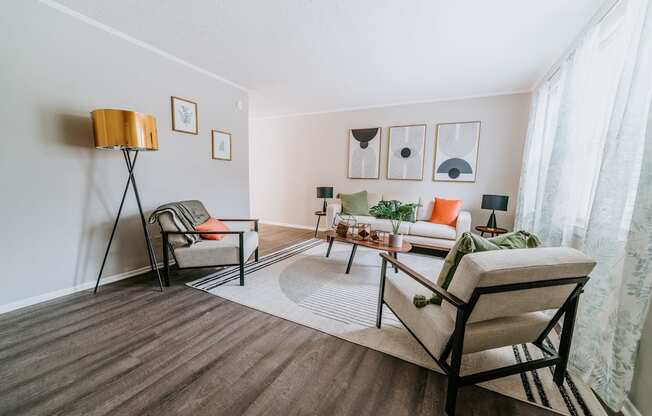 Renovated apartment Living Room at Midtown Oaks Townhomes in Mobile, AL