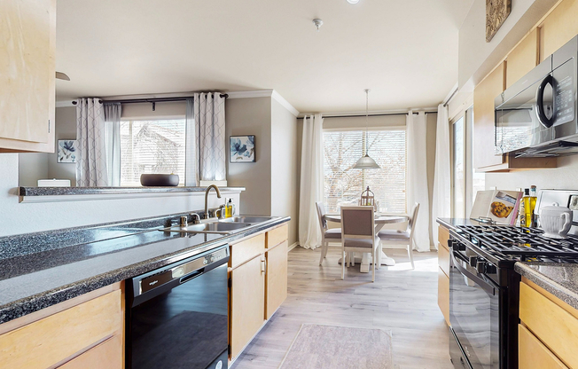 Experience contemporary comfort in this stunning kitchen and dining space.
