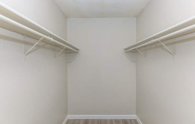 a spacious walk in closet in a 555 waverly unit