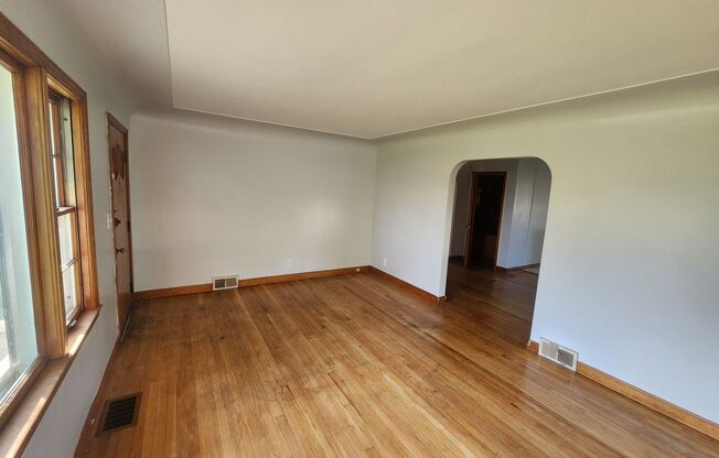 Charming 2 bedroom 1 bath with large rooms and attached carport - unfinished basement!