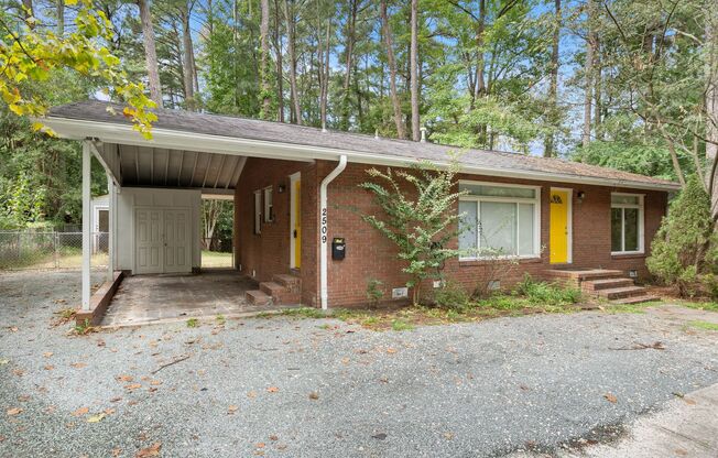 Sunny mid-century close to everything with hardwoods and fenced yard!