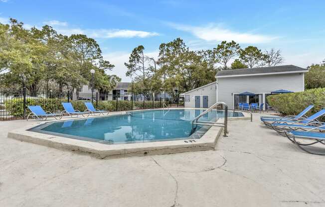 our resort style swimming pool is next to our clubhouse and has lounge chairs around it