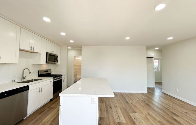 Welcome to your beautifully renovated single level attached home in the heart of Oceanside!