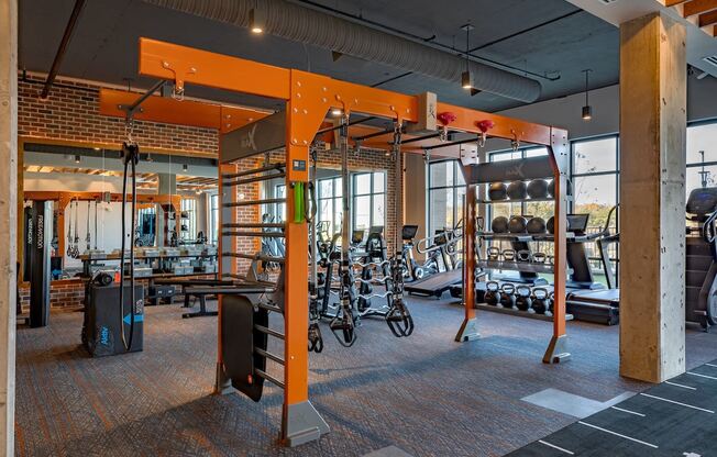 a gym with weights machines and other exercise equipment