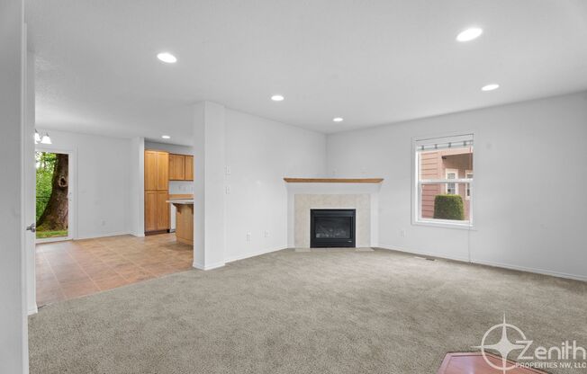 Inviting 3 Bedroom Washougal Home with Large Backyard Backing Up to Green Space! Upstairs Loft Space! Available Late-April!
