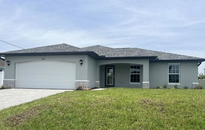 FREE APPLICATION SPECIAL- 3 Bedroom + Den - 2 Bathroom- NE Cape Coral