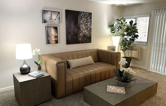 a living room with a couch and a coffee table