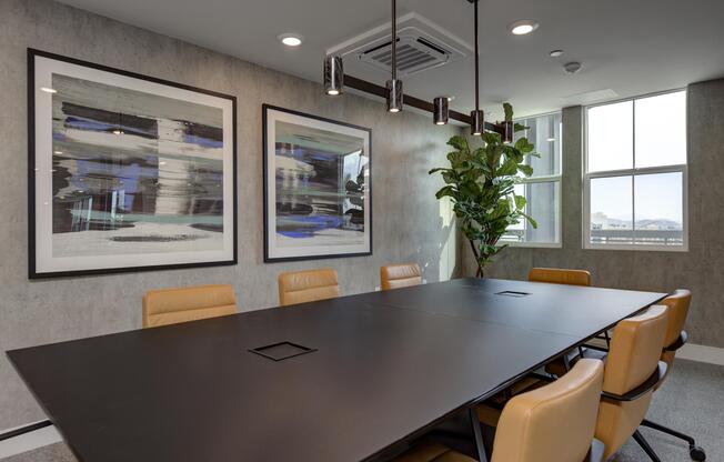 a desk with a laptop in a room